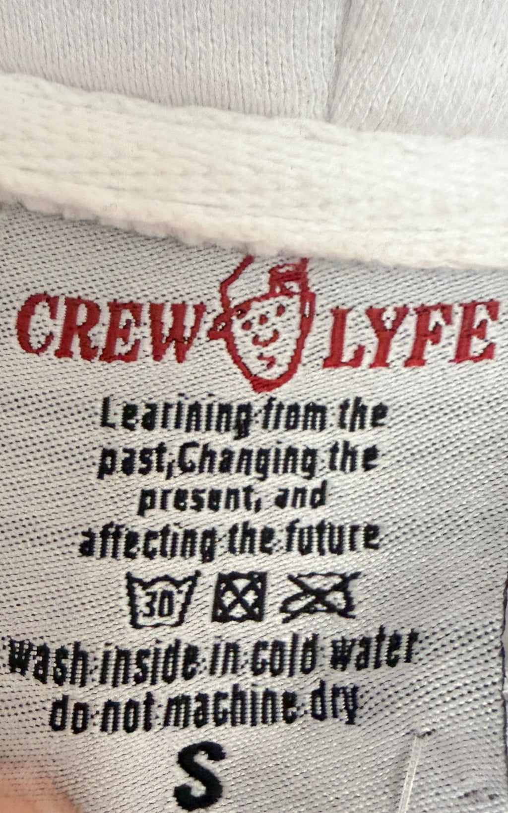Crew Lyfe Men's White X Anniversary Hoodie — brand label