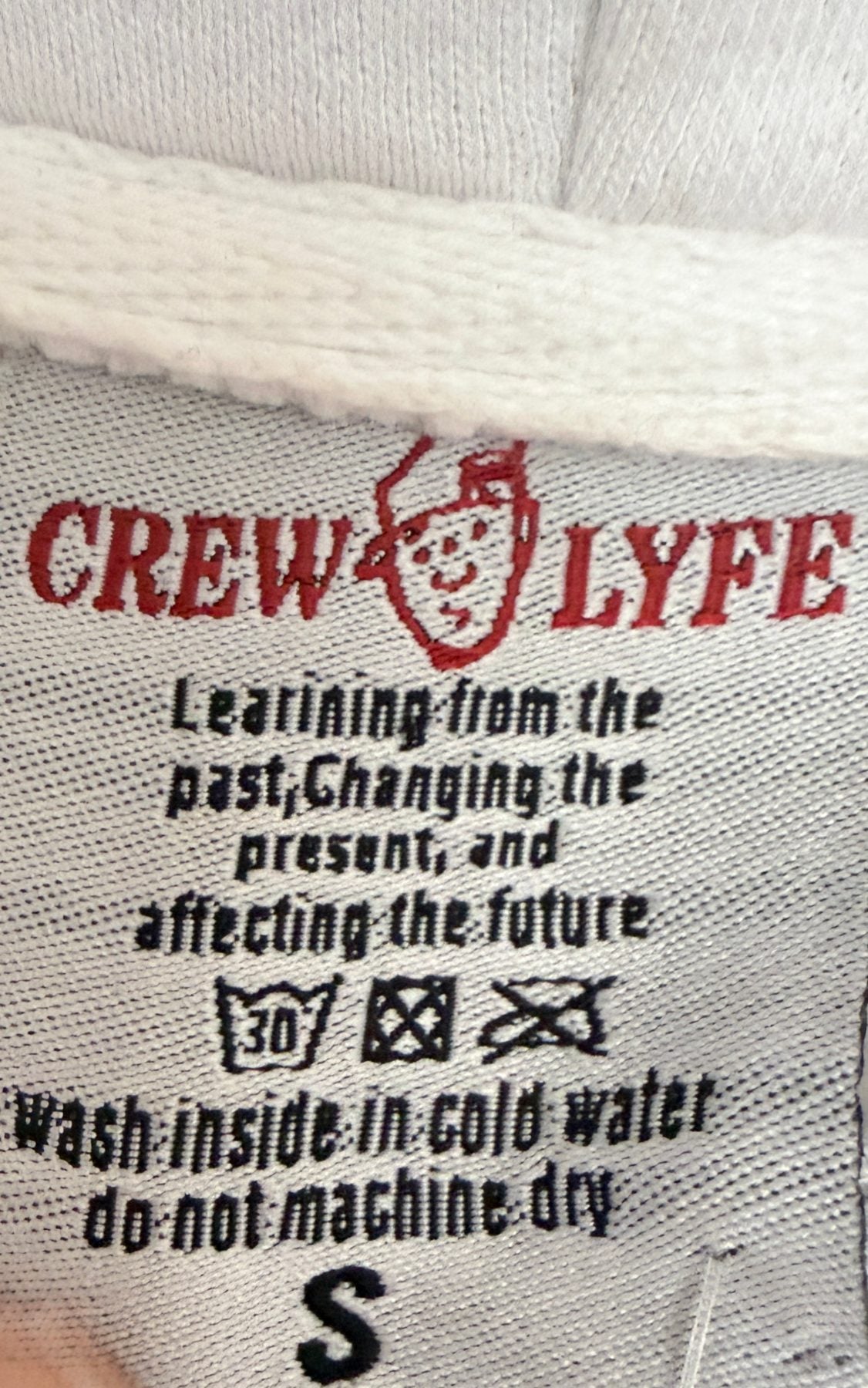 Crew Lyfe Men's White X Anniversary Hoodie — brand label