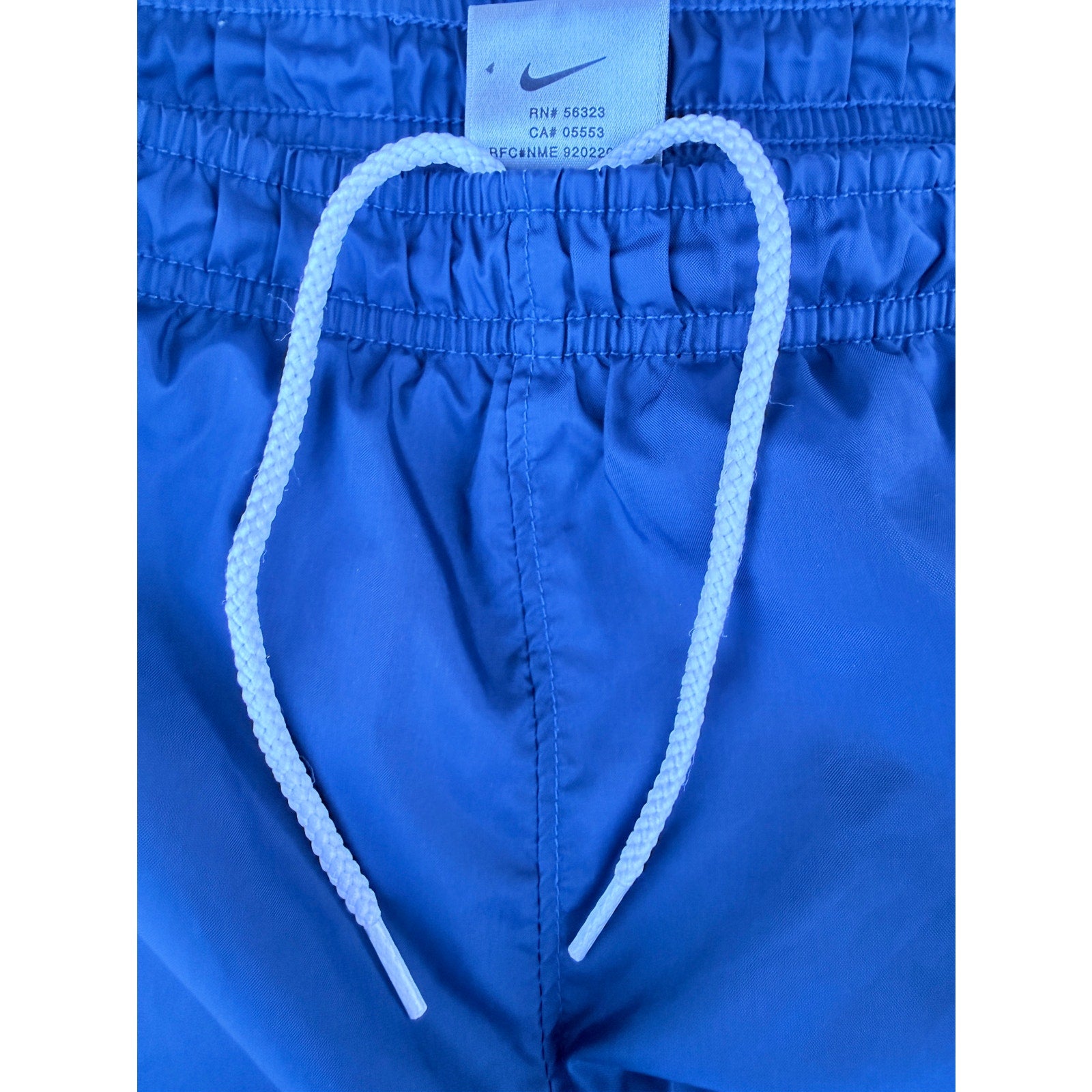 vintage 2000s Nike Track Pants Blue Youth L (14-16) Athletic Wind Pants fits a mens small