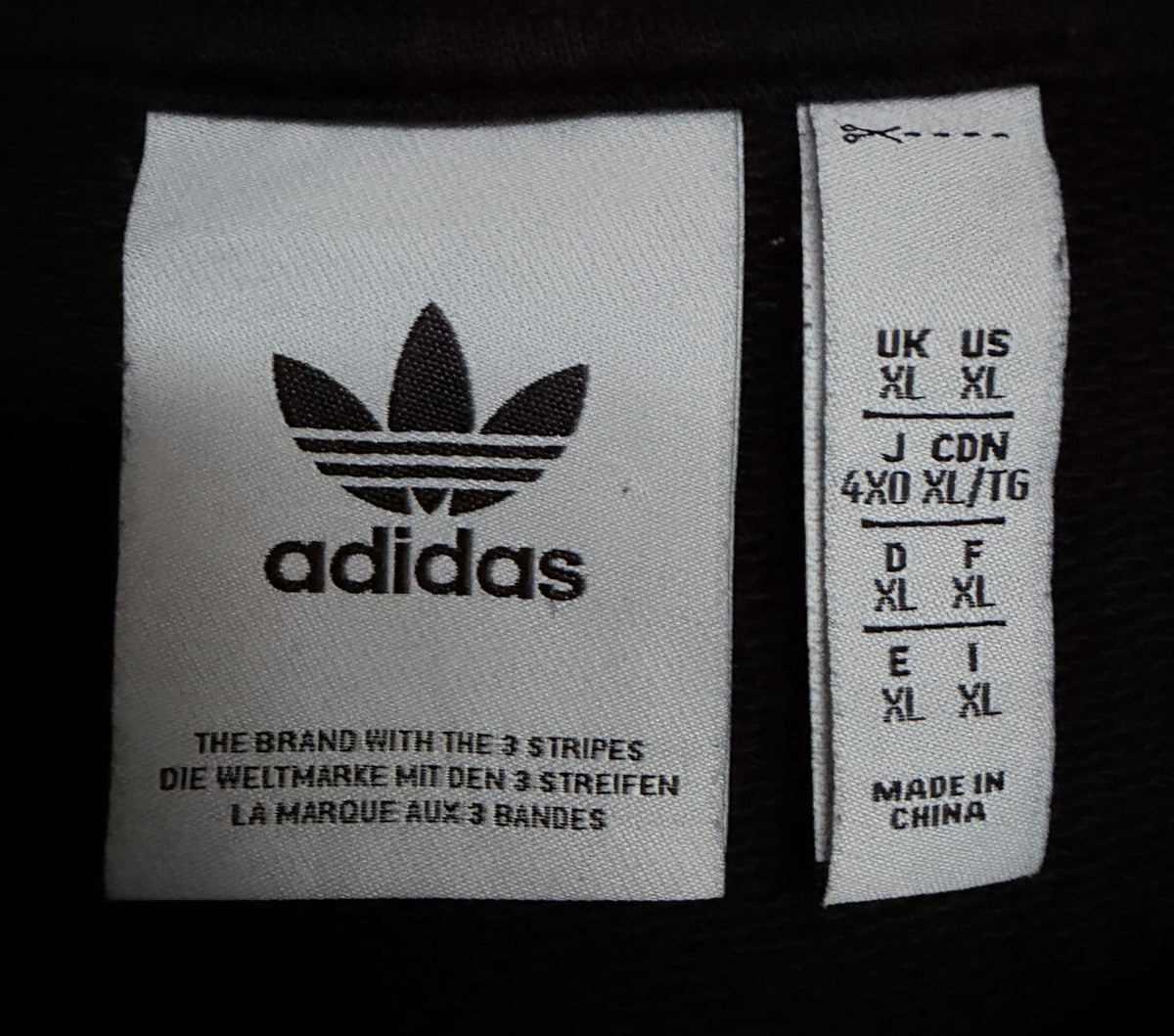 adidas Men's Black adidas Adventure Hoodie — brand label