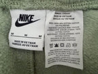 Nike Men's Green Fleece Shorts — brand label