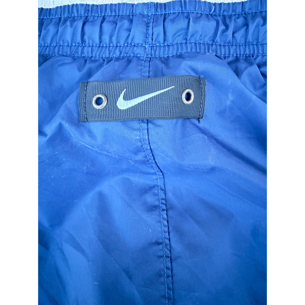 vintage 2000s Nike Track Pants Blue Youth L (14-16) Athletic Wind Pants fits a mens small