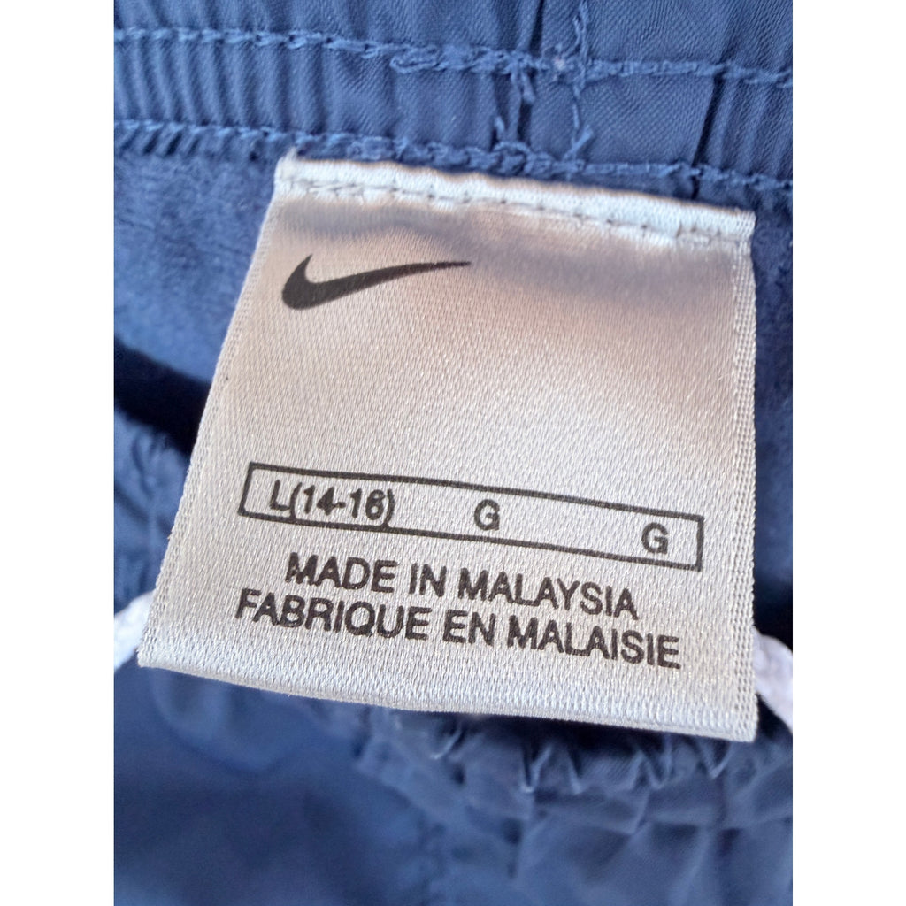 vintage 2000s Nike Track Pants Blue Youth L (14-16) Athletic Wind Pants fits a mens small